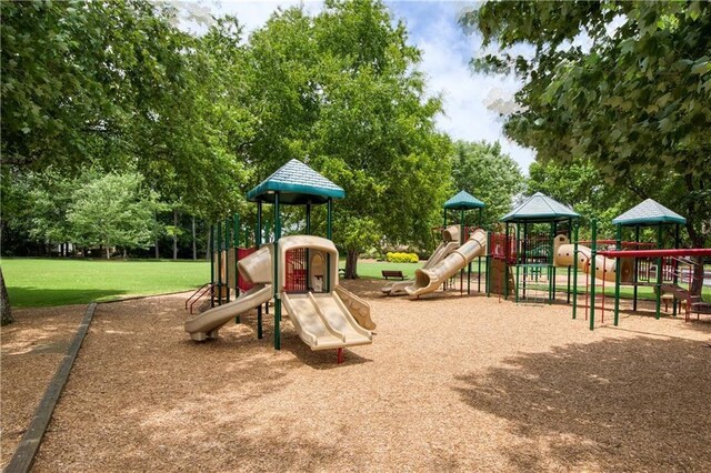 community play area with a yard