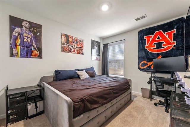 bedroom with carpet, visible vents, and baseboards