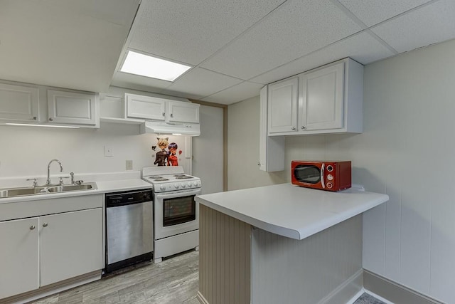 kitchen featuring sink, white electric stove, white cabinetry, stainless steel dishwasher, and kitchen peninsula