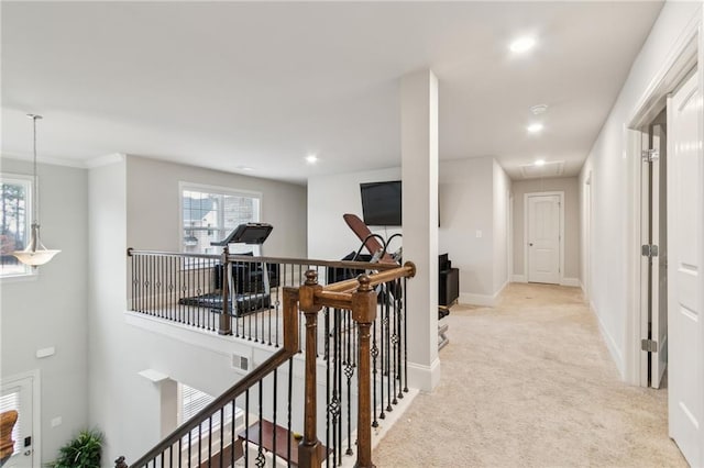 hall featuring recessed lighting, light carpet, an upstairs landing, baseboards, and attic access