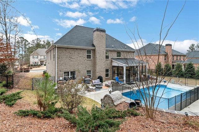 view of pool with a fenced backyard, a fenced in pool, and a patio