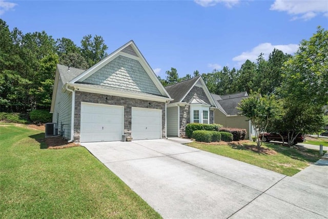 1856 Temple Park Dr, Loganville, GA 30052 - view of front of home with a garage, stone siding, concrete driveway, and a front lawn