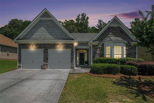 1856 Temple Park Dr, Loganville, GA 30052 - view of front of property with stone siding, an attached garage, driveway, and a front yard
