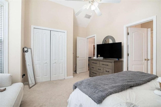 1856 Temple Park Dr, Loganville, GA 30052 - carpeted bedroom featuring a closet, vaulted ceiling, and ceiling fan