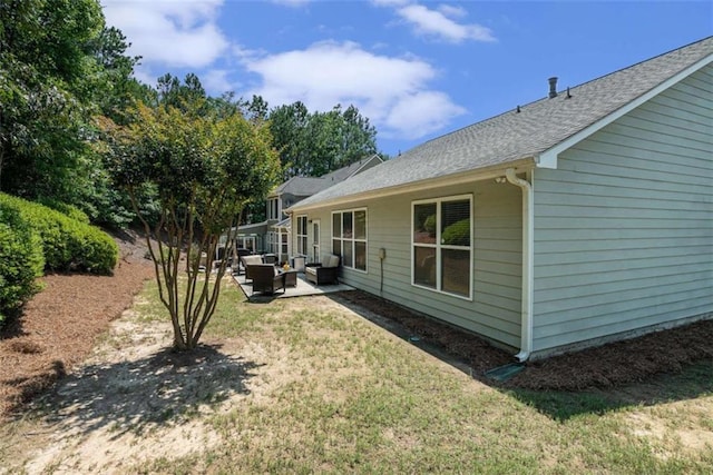 1856 Temple Park Dr, Loganville, GA 30052 - view of green lawn featuring outdoor lounge area and a patio