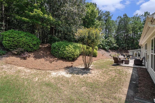 1856 Temple Park Dr, Loganville, GA 30052 - view of grassy yard with an outdoor living space and a patio