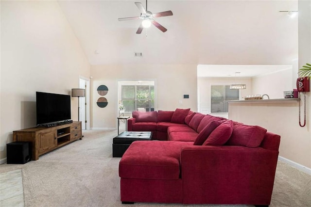 1856 Temple Park Dr, Loganville, GA 30052 - living area with carpet, high vaulted ceiling, and ceiling fan