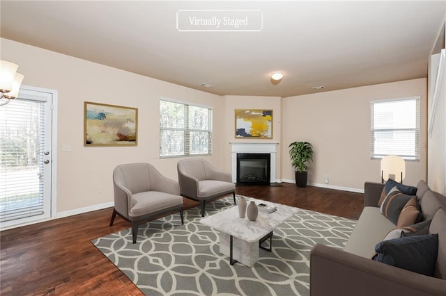 living room with dark hardwood / wood-style floors