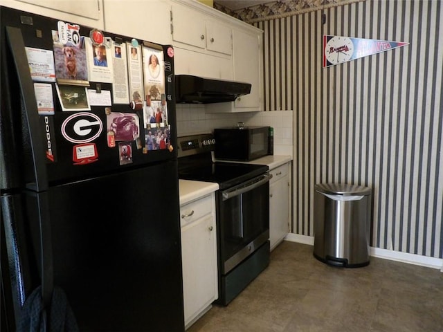 kitchen with extractor fan, white cabinets, and black appliances