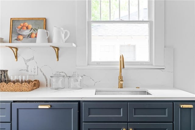 bar area featuring a sink