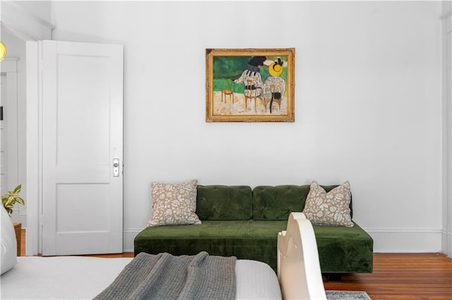 bedroom with wood finished floors