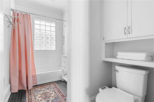 full bathroom featuring toilet, shower / tub combo, and tile patterned flooring