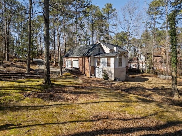 exterior space with a front yard