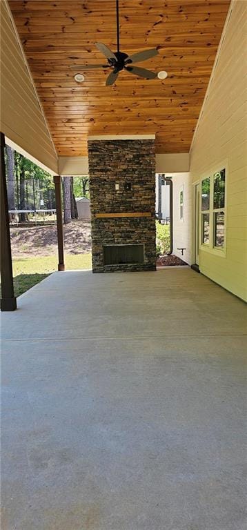 6093 Wayarer Dr, Villa Rica, GA 30180 - view of patio / terrace with ceiling fan and an outdoor stone fireplace