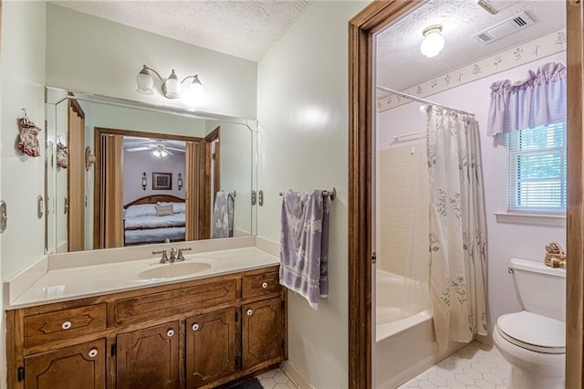 1667 Quail Run, Conyers, GA 30094 - bathroom with connected bathroom, vanity, a textured ceiling, shower / tub combo, and tile patterned flooring