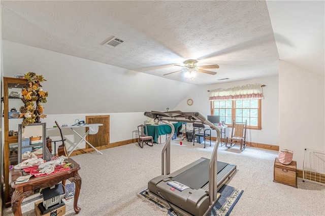 1667 Quail Run, Conyers, GA 30094 - exercise area featuring ceiling fan, a textured ceiling, lofted ceiling, and carpet floors