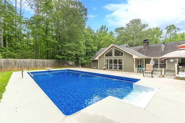 1667 Quail Run, Conyers, GA 30094 - view of swimming pool featuring a patio and a fenced backyard