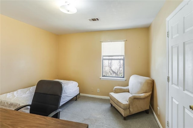 bedroom with light carpet