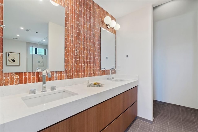 bathroom with vanity and tile patterned floors