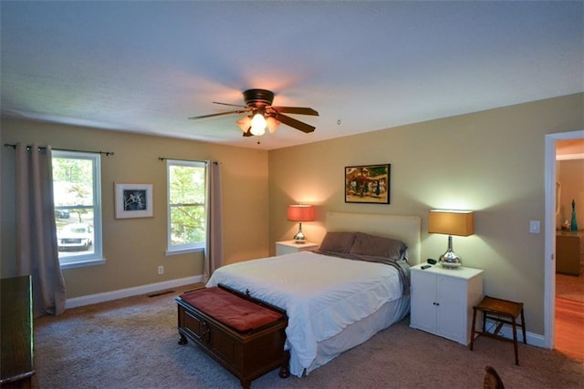 carpeted bedroom featuring ceiling fan