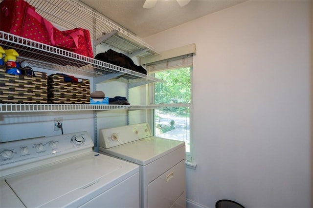 laundry area featuring washing machine and dryer and ceiling fan