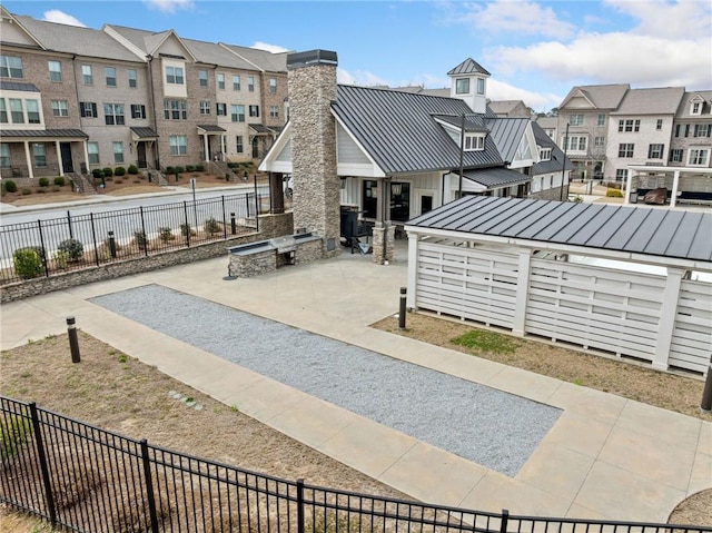 surrounding community featuring fence and a residential view