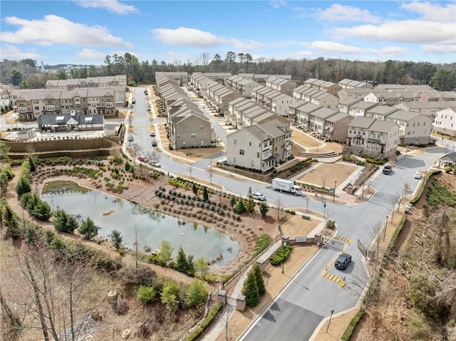 aerial view with a water view and a residential view