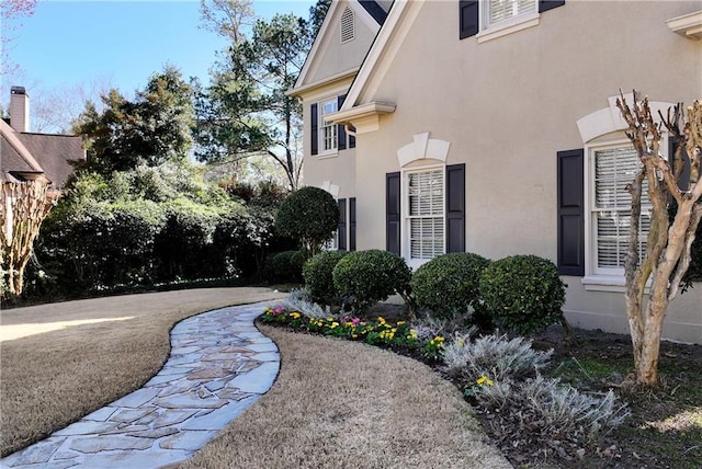 exterior space with stucco siding