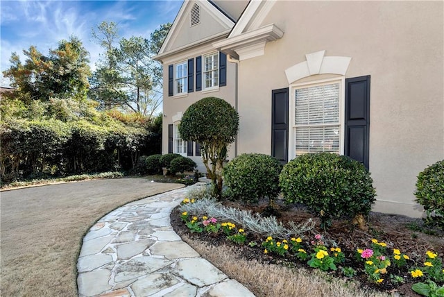 exterior space featuring stucco siding