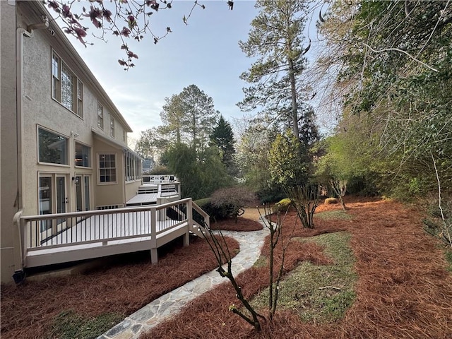 view of yard featuring a deck