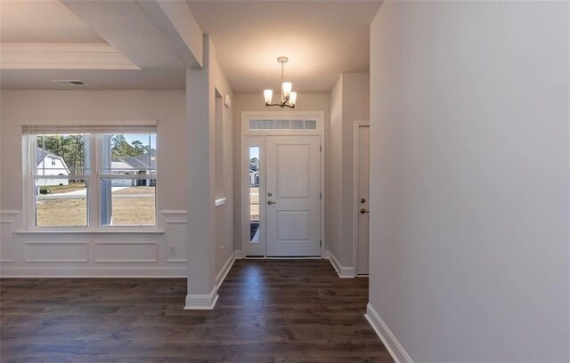 653 Forest Way, Cornelia, GA 30531 - entryway with a chandelier, dark wood-type flooring, and baseboards