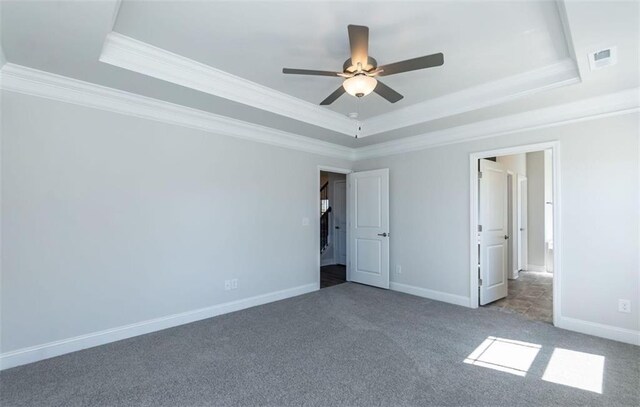 653 Forest Way, Cornelia, GA 30531 - unfurnished bedroom with a raised ceiling, ornamental molding, carpet flooring, baseboards, and a ceiling fan