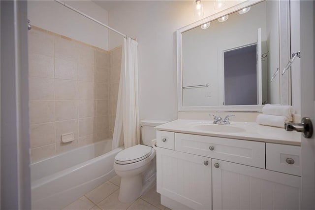 bathroom with toilet, tile patterned flooring, shower / bath combo with shower curtain, and vanity