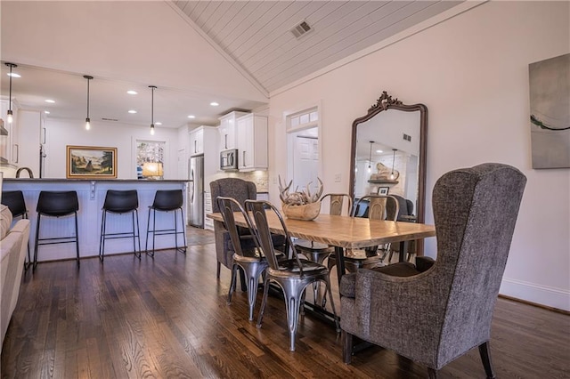 dining room featuring dark wood-style floors, recessed lighting, visible vents, high vaulted ceiling, and baseboards