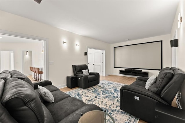 home theater featuring light hardwood / wood-style flooring