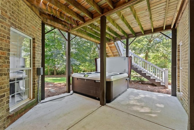 view of patio featuring a hot tub