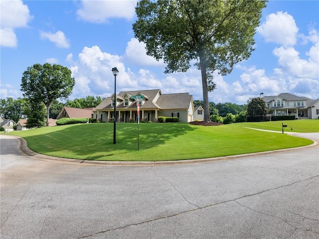 11 Stillwater Way, Hoschton, GA 30548 - view of front facade featuring a front lawn