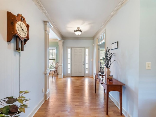 11 Stillwater Way, Hoschton, GA 30548 - entrance foyer featuring ornate columns, light wood-style floors, and ornamental molding