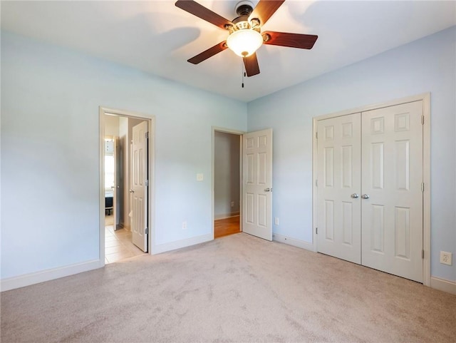 11 Stillwater Way, Hoschton, GA 30548 - unfurnished bedroom featuring light colored carpet, a closet, and ceiling fan