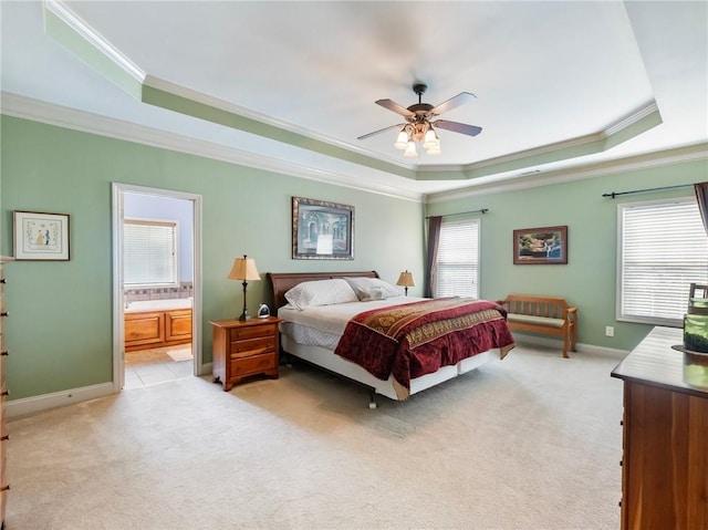 11 Stillwater Way, Hoschton, GA 30548 - bedroom featuring a tray ceiling, crown molding, light carpet, and connected bathroom