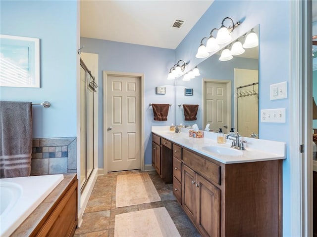 11 Stillwater Way, Hoschton, GA 30548 - bathroom with double vanity, a shower with shower door, a bath, and stone finish flooring