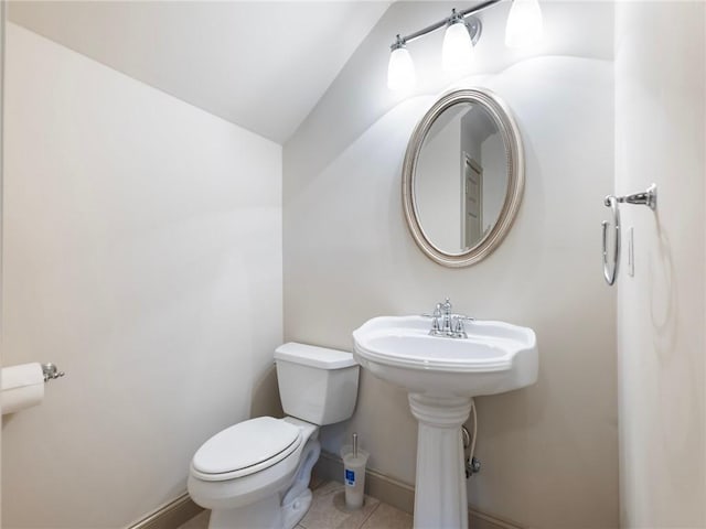 11 Stillwater Way, Hoschton, GA 30548 - half bathroom featuring vaulted ceiling and tile patterned flooring