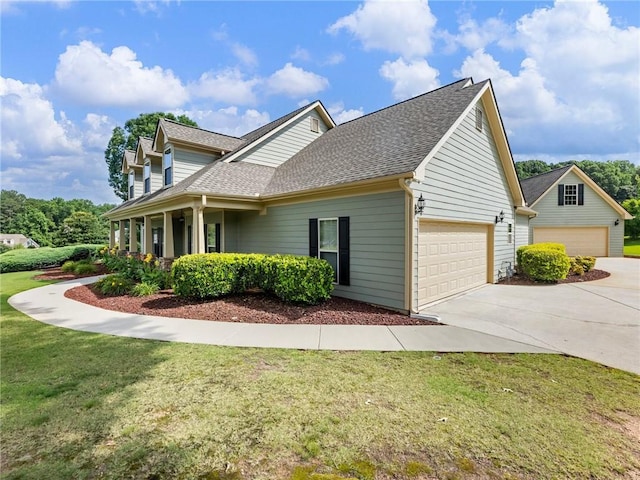 11 Stillwater Way, Hoschton, GA 30548 - view of home's exterior featuring a lawn, roof with shingles, a garage, and driveway