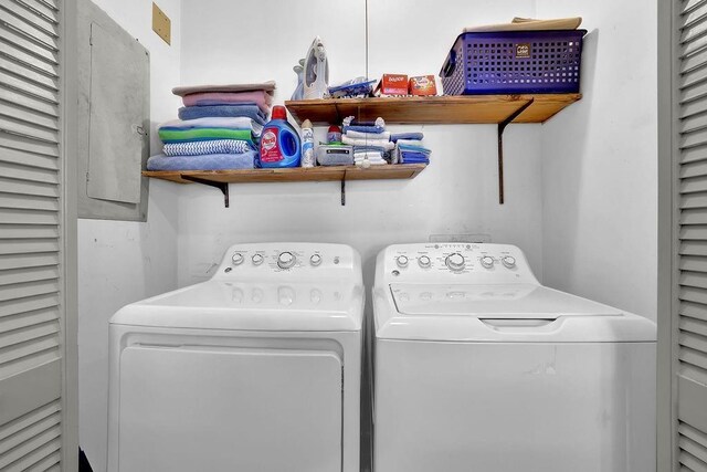 laundry room with independent washer and dryer