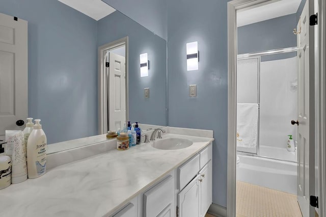 full bathroom with shower / bath combination with glass door, vanity, and toilet