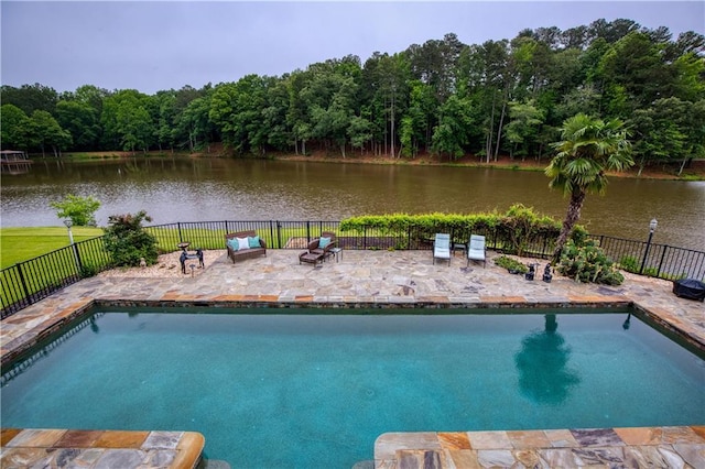 2675 Portabella Ln, Cumming, GA 30041 - view of pool with a patio, a water view, and a view of trees