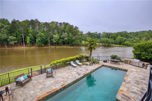 2675 Portabella Ln, Cumming, GA 30041 - view of pool with a patio area, a water view, a forest view, and an outdoor hangout area