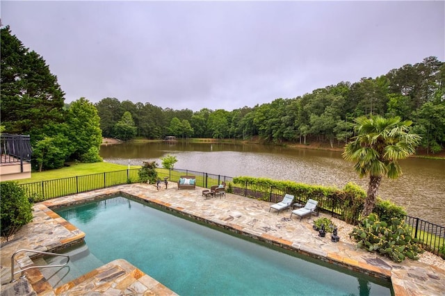 2675 Portabella Ln, Cumming, GA 30041 - view of swimming pool featuring a water view, a patio area, and a view of trees