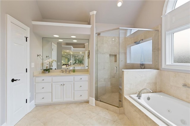 2675 Portabella Ln, Cumming, GA 30041 - bathroom with vanity, a jetted tub, a stall shower, vaulted ceiling, and tile patterned flooring