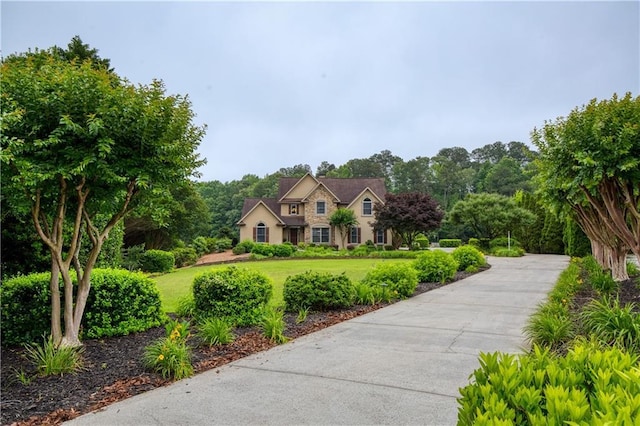 2675 Portabella Ln, Cumming, GA 30041 - view of front facade with a front lawn
